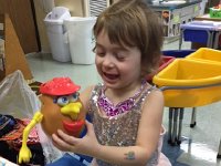 Valerie at pre-school Feb 15  Valerie and Mr. Potato Head at Day Care (Feb 15)